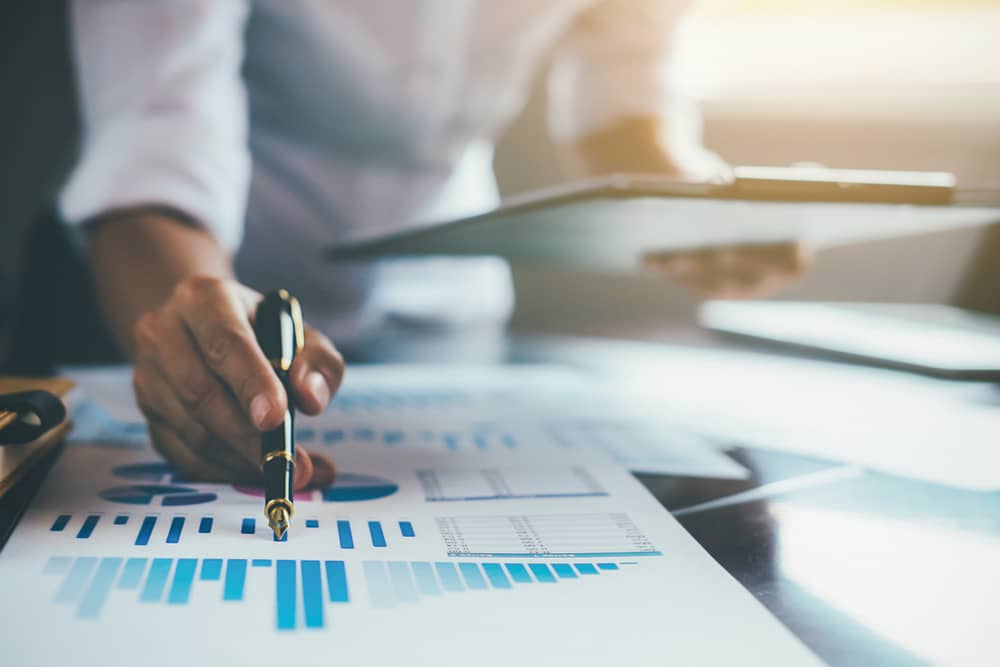 A man looks over financial documentation.