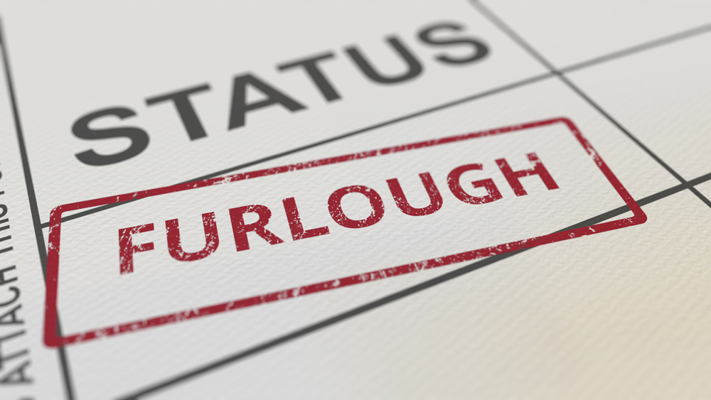 Red Furlough Stamp On Paper Form.