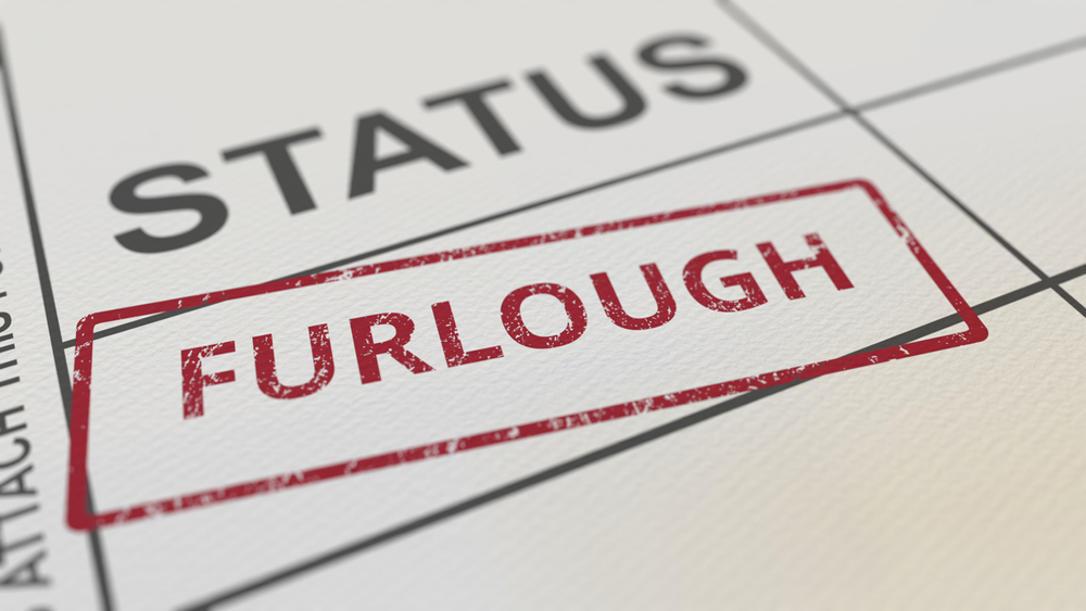 Red Furlough Stamp On Paper Form.