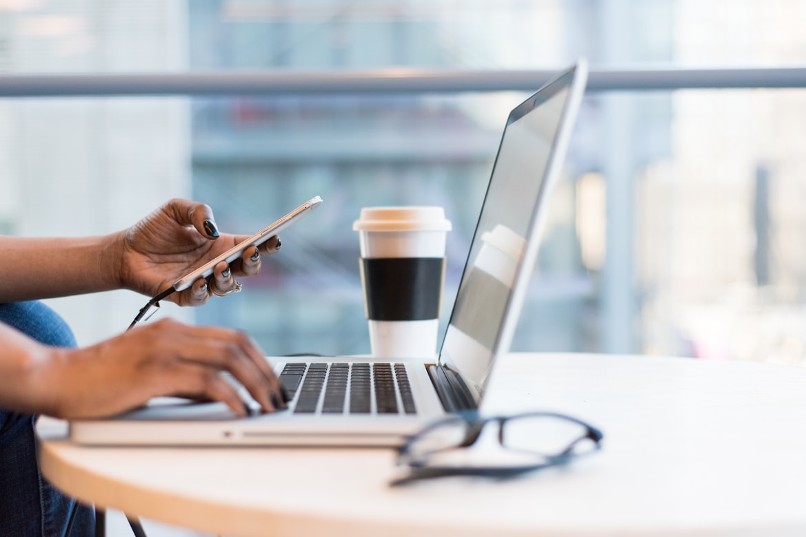 Woman works on macbook