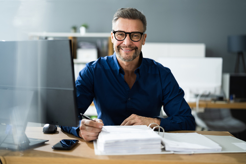 accountant sitting behind a desk