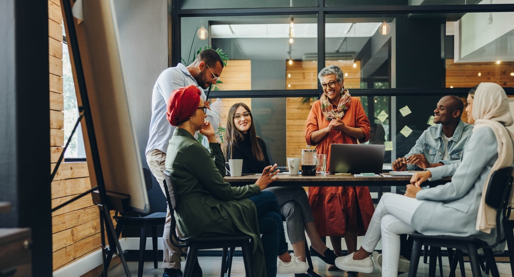 Happy,Businesspeople,Smiling,Cheerfully,During,A,Meeting