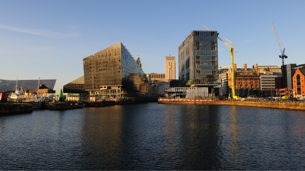 Image of the Liverpool skyline with cranes depicting construction