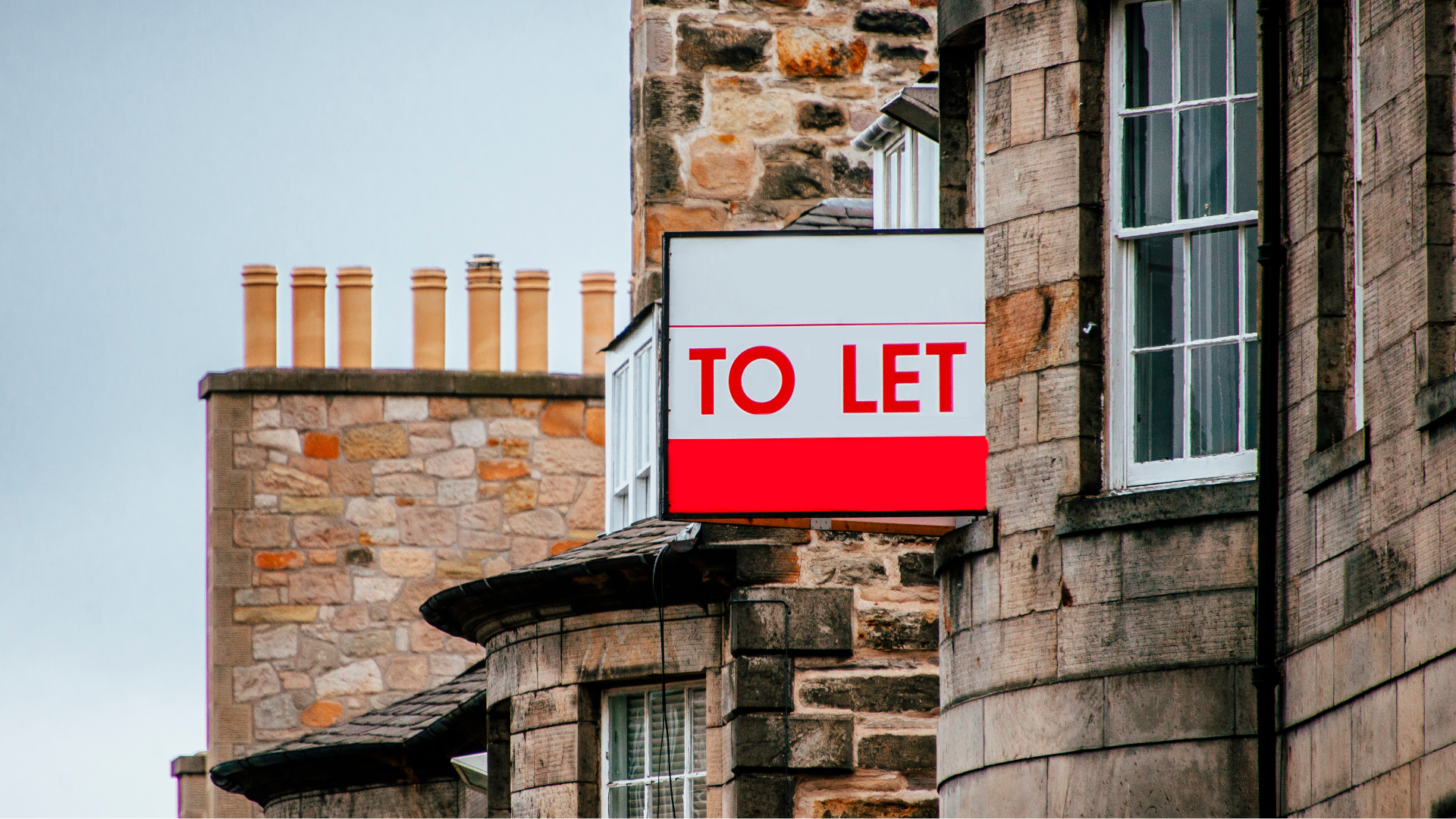 An image of a property with a to let sign affixed