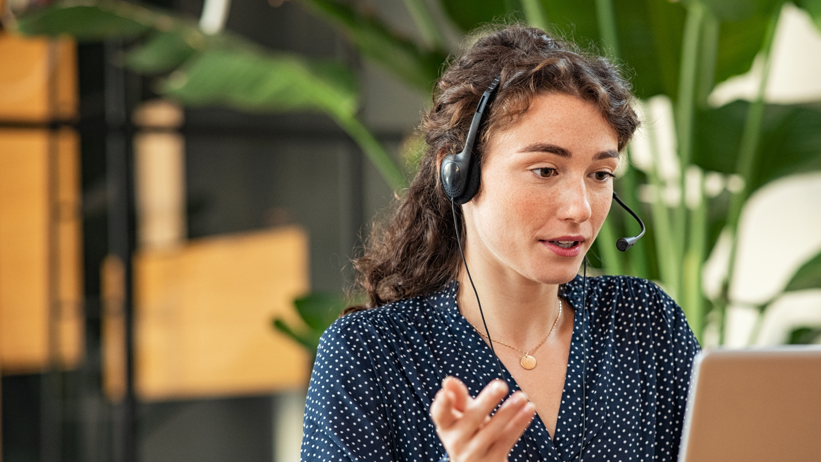 image of charity finance manager having a remote audit chatting on a teams call